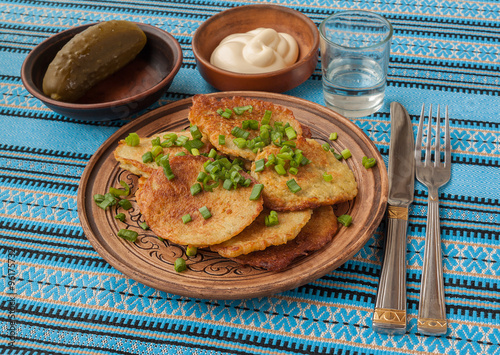 Traditional Ukrainian homemade potato pancakes (draniks) photo