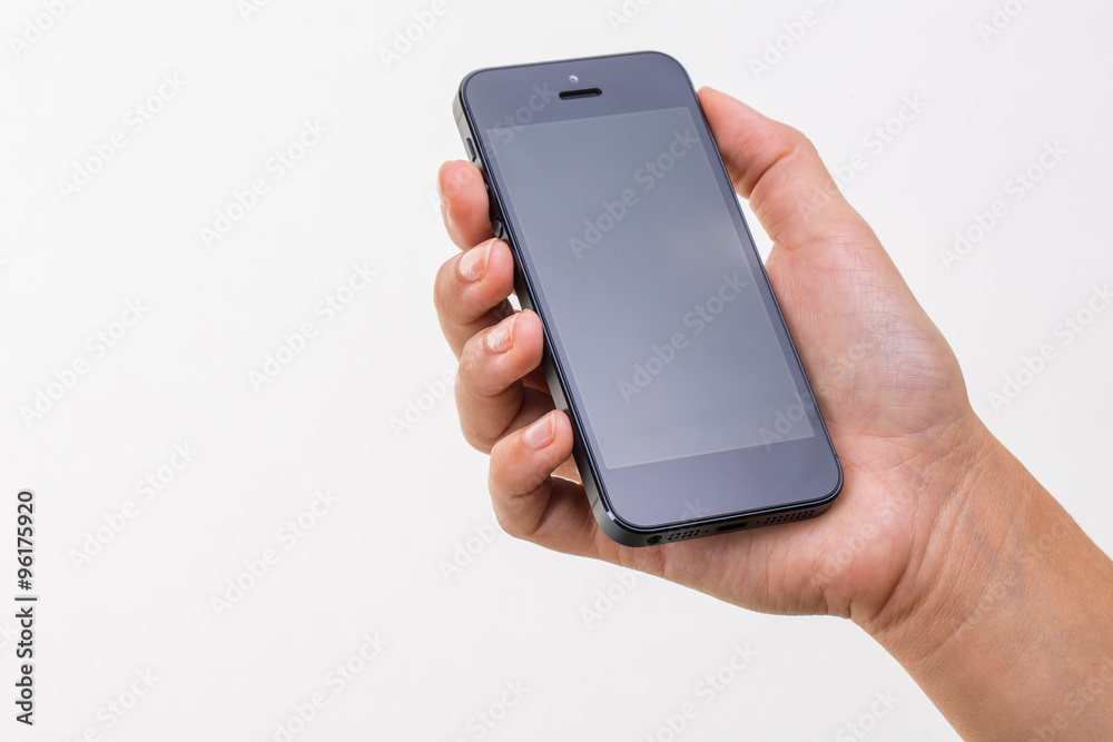 Female hand holding a smart phone, isolated on white Female hand holding a smart phone, isolated on white