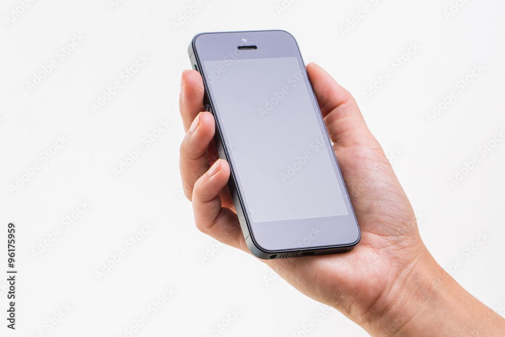 Female hand holding a smart phone, isolated on white Female hand holding a smart phone, isolated on white