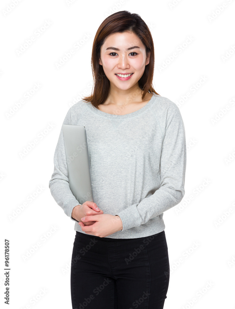 Young Woman hold with laptop computer Young Woman hold with laptop computer