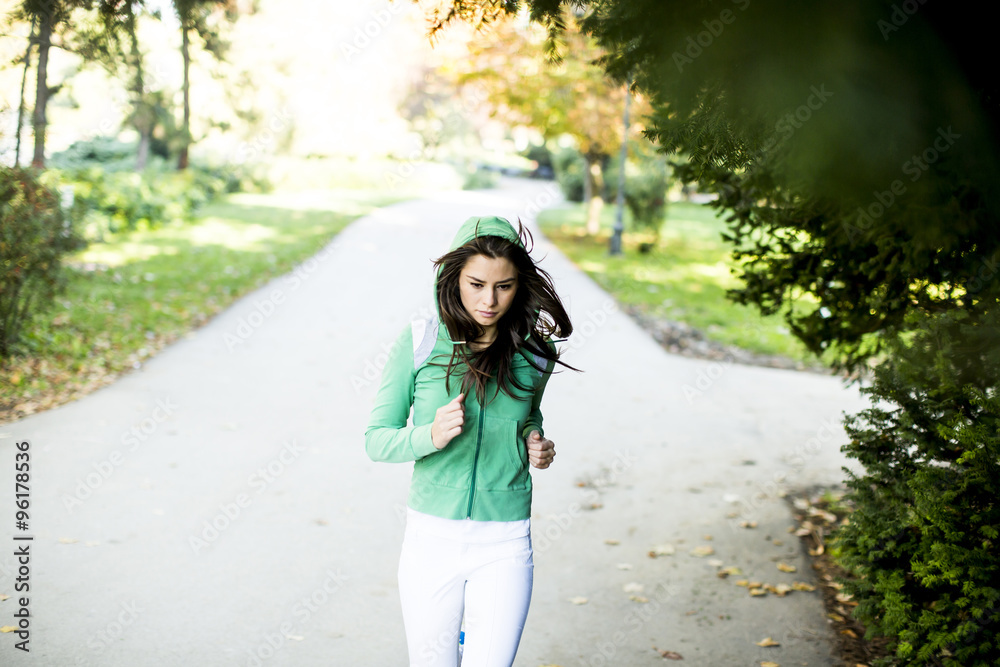 Young woman running in the park