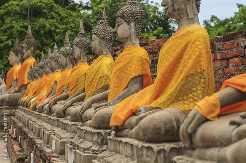 Row of Buddha statues at temple in Ayutthaya  Thailand