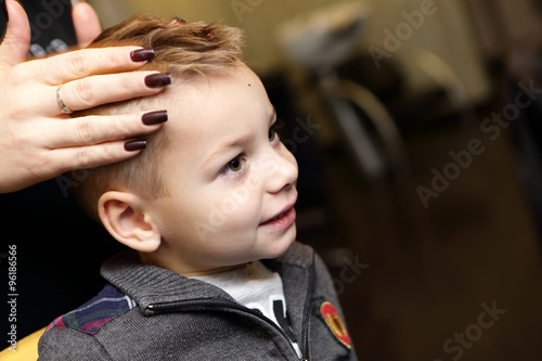 Child at hairdresser salon