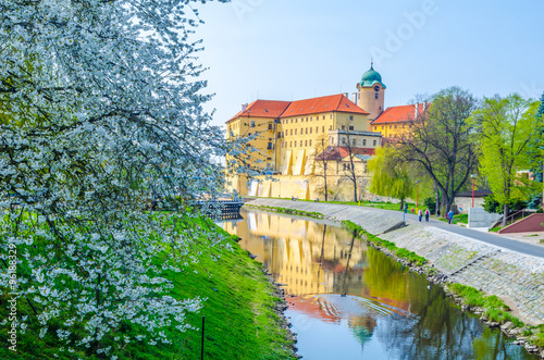 view of yellow building of chateau of podebrady in czech republic. photo