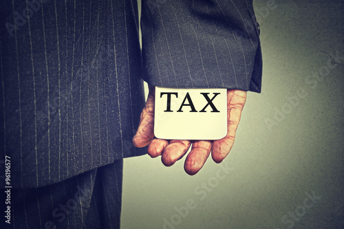 Corruption illegal criminal activity tax evasion economy ponzi scheme concept photo