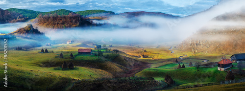 Rural mountain landscape in autumn morning - Fundatura Ponorului, Romania photo