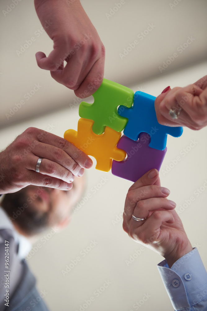 business people group assembling jigsaw puzzle business people group assembling jigsaw puzzle