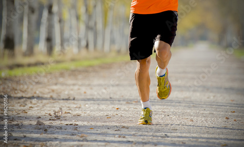 sport man running outdoors in off road trail ground in fitness and healthy lifestyle concept photo