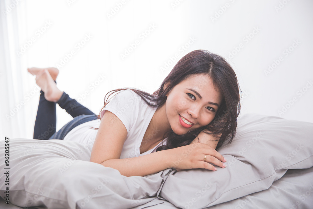 Woman laying on the bed Woman laying on the bed