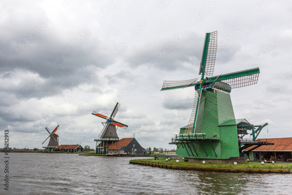 Windmills and rural houses in Zaanse Schans near Amsterdam, Netherlands