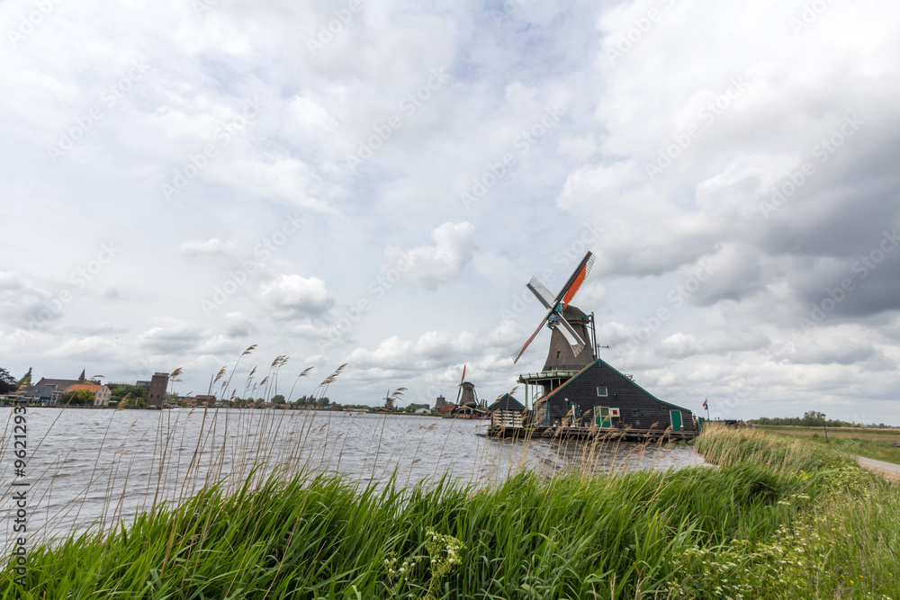 Windmills and rural houses in Zaanse Schans near Amsterdam, Netherlands