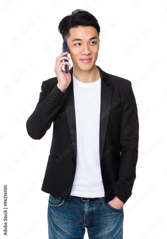Young Businessman talk to mobile phone Young Businessman talk to mobile phone