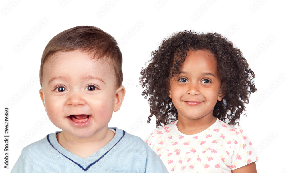Two beautiful children looking at camera