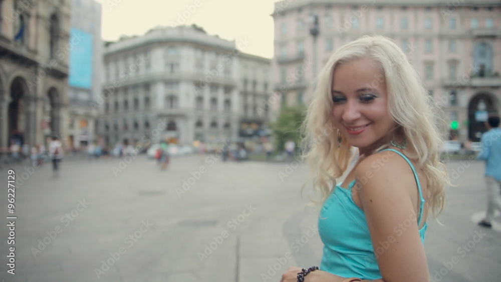 Amazing blonde walking down the street of Milan Amazing blonde walking down the street of Milan