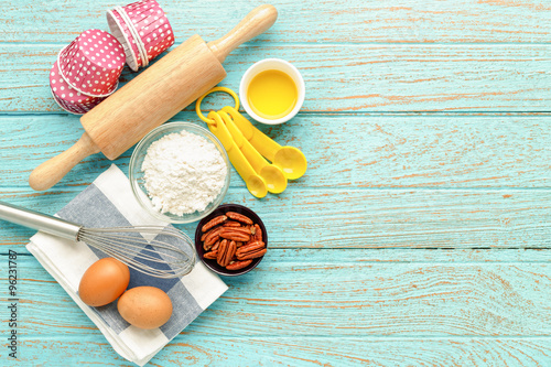 Baking background with ingredients and utensils photo