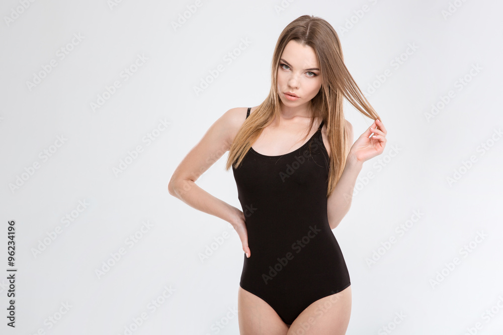 Fashion photo of beautiful young lady posing in swimsuit Fashion photo of beautiful young lady posing in swimsuit
