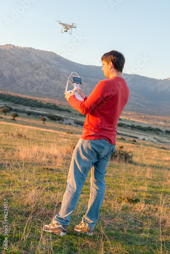 Man guiding a drone