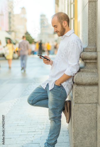 Man using phone in the street