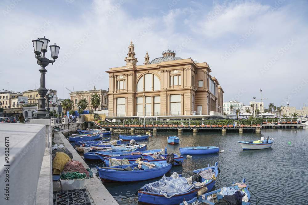 BARI, ITALY, NOVEMBER 15, 2015: Fishermen boats are anchoring inside port of Bari in Italy.
