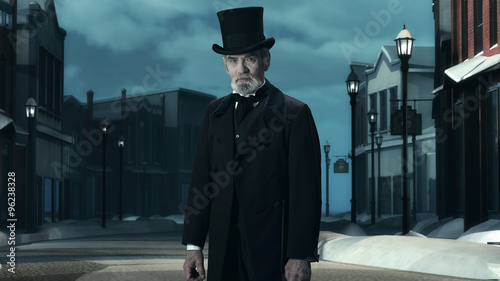 Photography Dickens Scrooge Man in Old Winter Street.