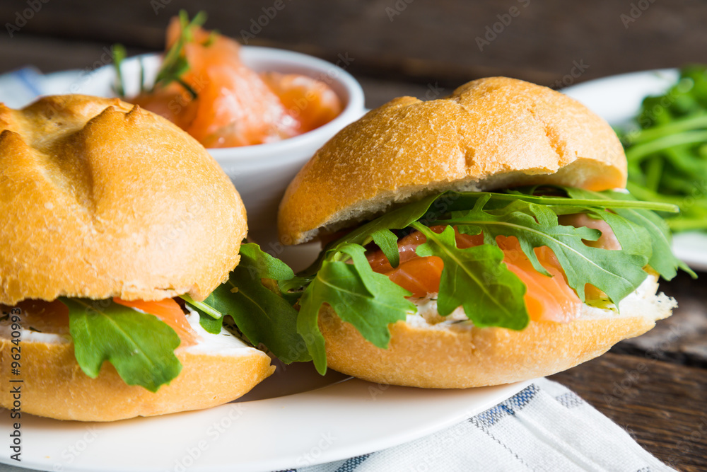 Sandwich with cream cheese salmon and arugula Sandwich with cream cheese salmon and arugula