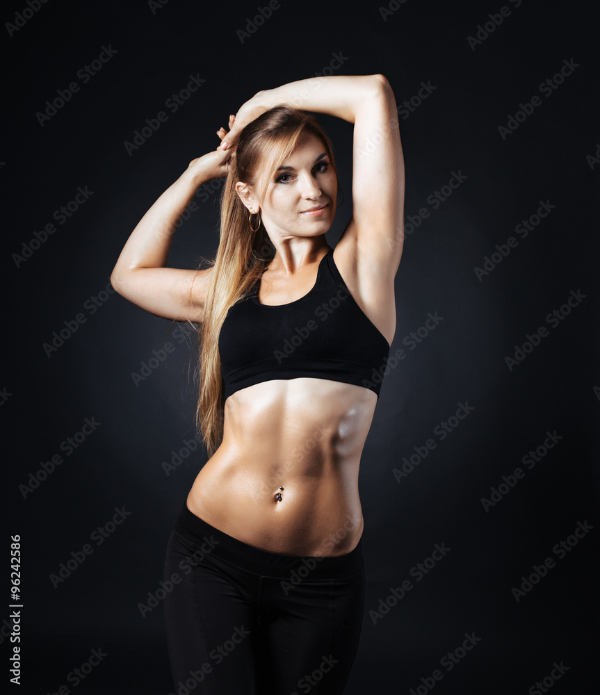 Sporty girl doing studio shot over white background Sporty girl doing studio shot over white background