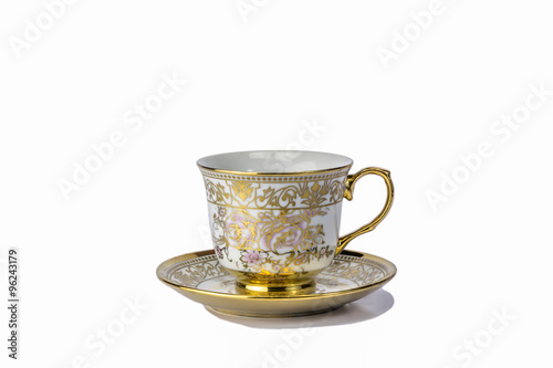 Antique tea cup on white background