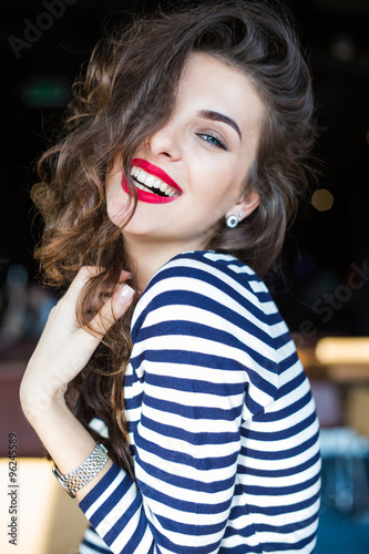 Close up portrait of beautiful smiling young woman