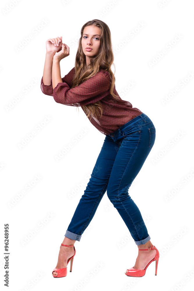 The young dancing girl, isolated on white in full length. The young dancing girl, isolated on white in full length.