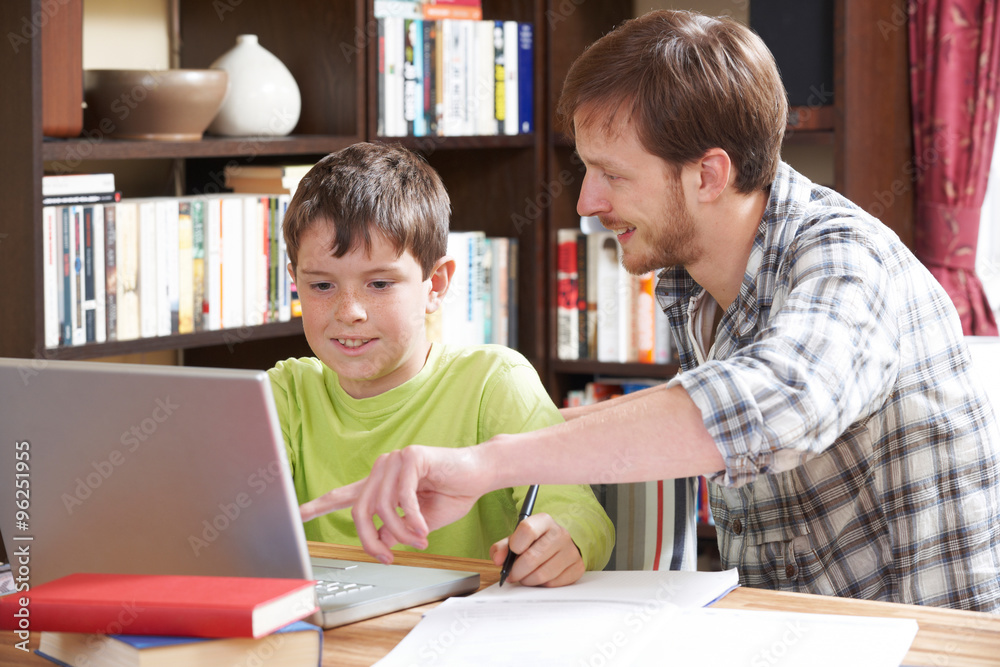 Boy Studying With Home Tutor Boy Studying With Home Tutor