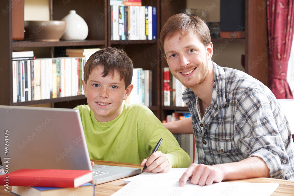 Boy Working At With Tutor At Home Boy Working At With Tutor At Home