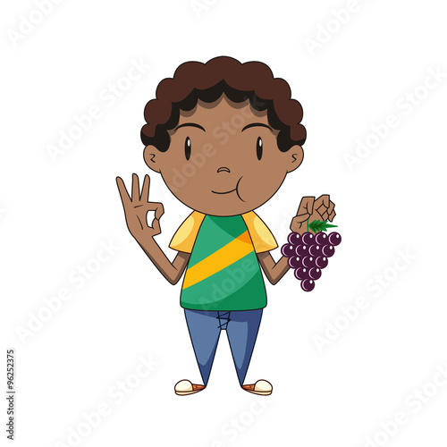 Boy eating grapes