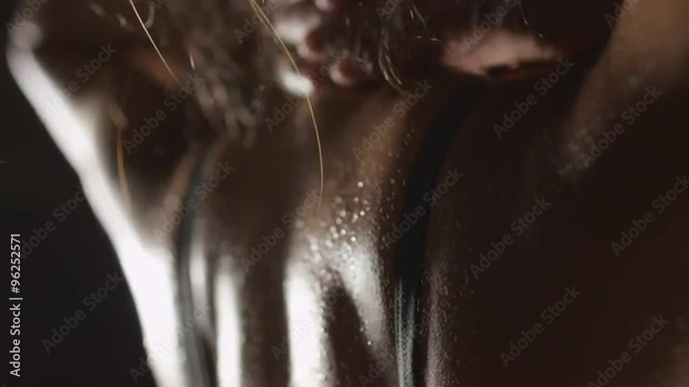 Athletic young woman showing off sweaty back