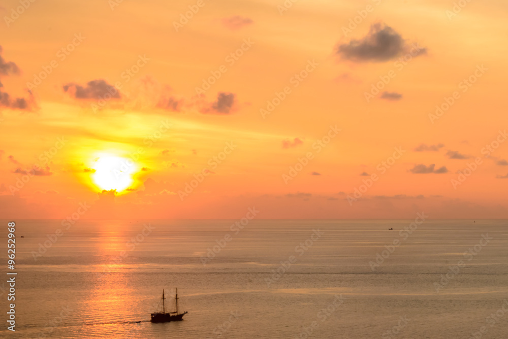 Beautiful sunset with boat seen from Promthep cape in Phuket Thailand