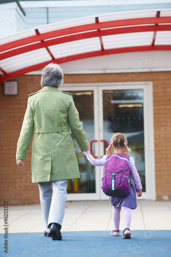 Grandmother Taking Granddaughter To School