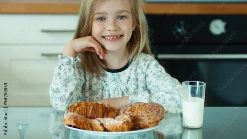 Portrait girl admiring sweet rolls Portrait girl admiring sweet rolls