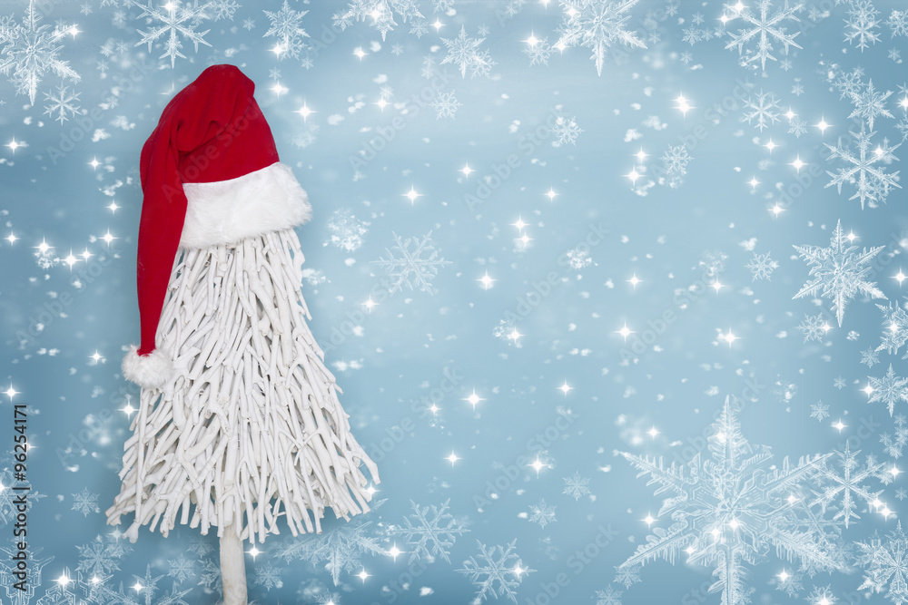 Christmas tree wearing a Santa Claus hat Christmas tree wearing a Santa Claus hat