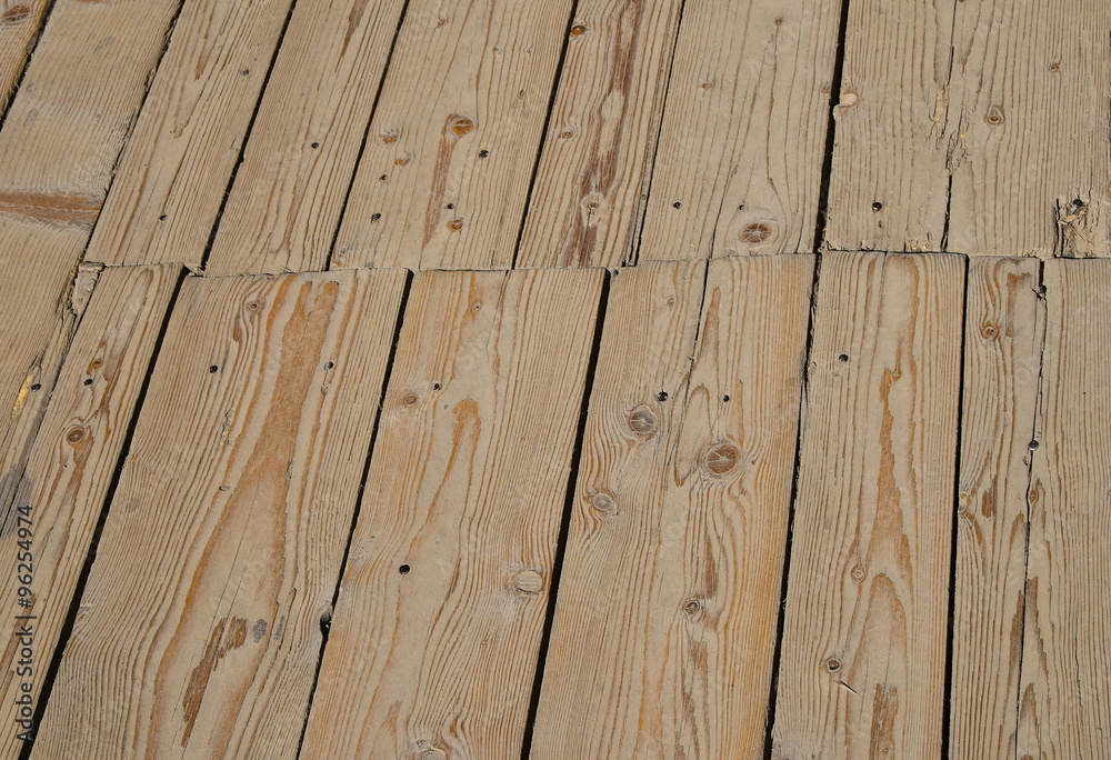 Fototapeta premium Vintage wooden surface with planks and gaps in perspective