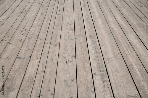 Vintage wooden surface with planks and gaps in perspective