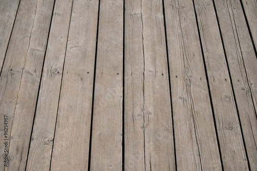 Vintage wooden surface with planks and gaps in perspective