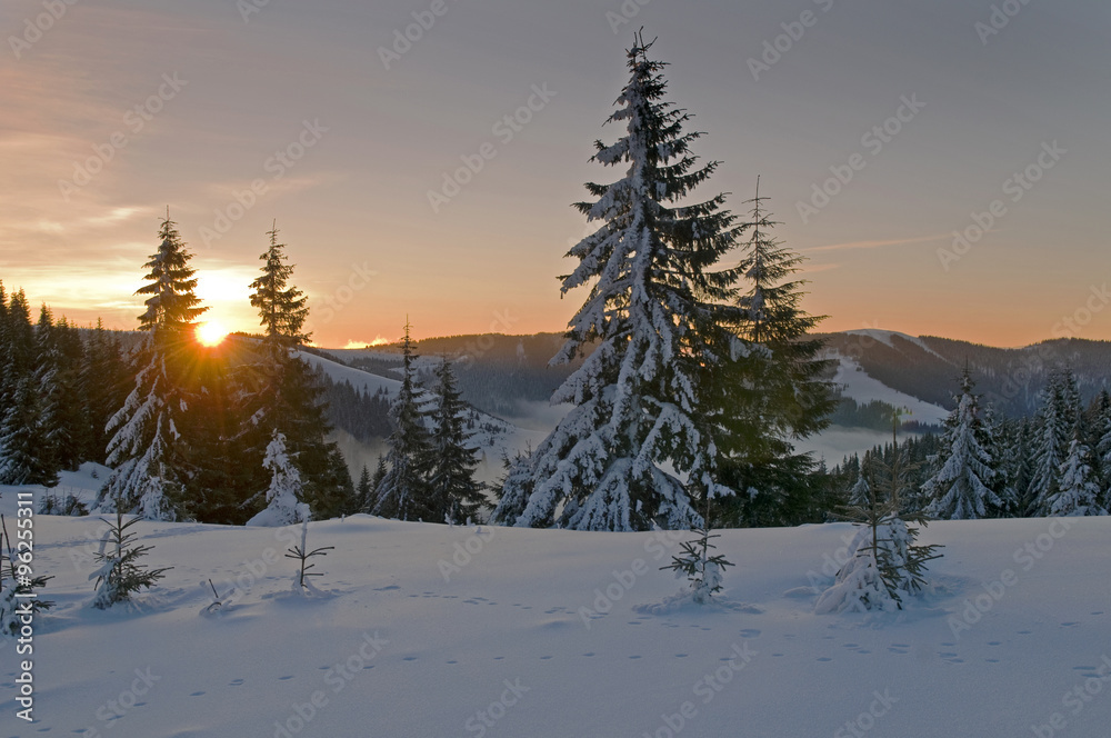 morning sun in winter mountains