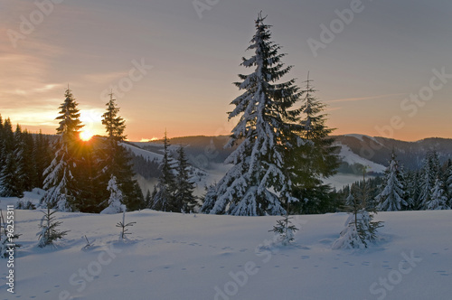 morning sun in winter mountains
