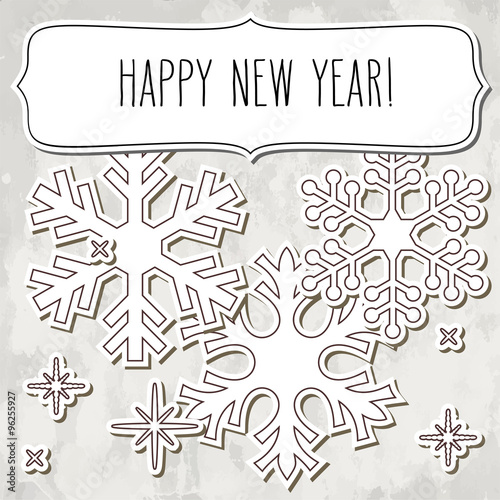Paper snowflakes frame and New Year greetings