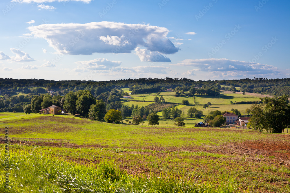 Rural landscape with a Farm and a fileld
