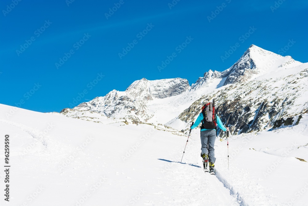 Ski touring in sunny weather.