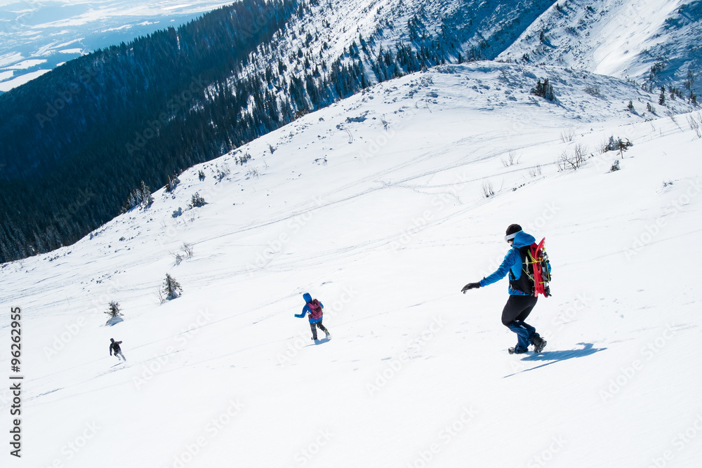 roup of tourists running from the mountain