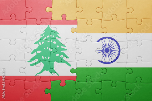 puzzle with the national flag of india and lebanon photo