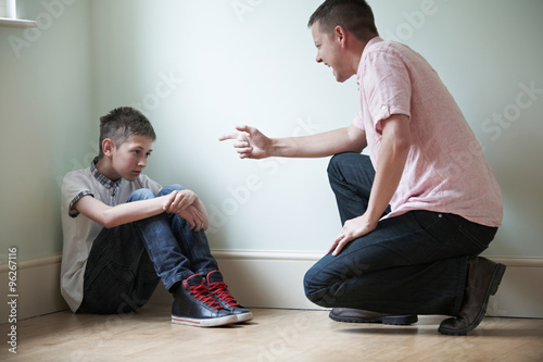 Bild auf Leinwand Father Being Physically Abusive Towards Son
