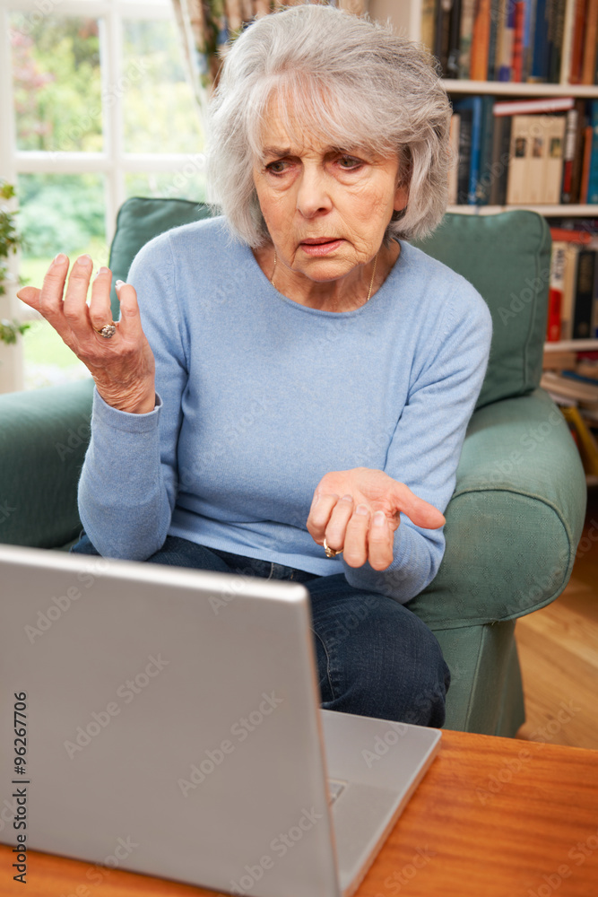 Frustrated Senior Woman Using Laptop Frustrated Senior Woman Using Laptop