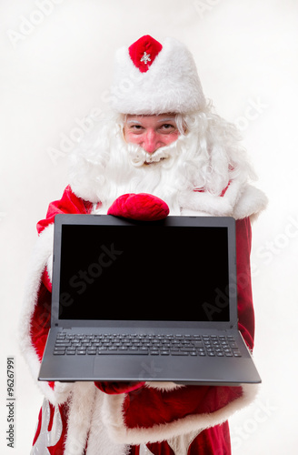 Santa Claus with laptop